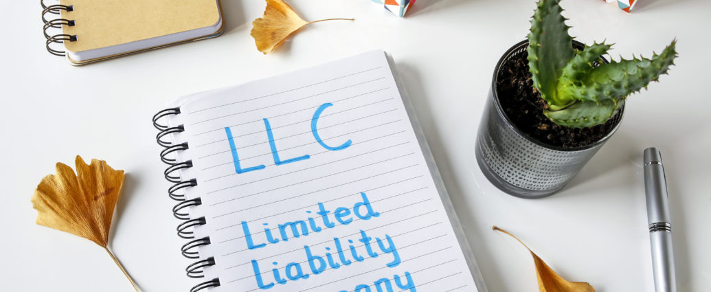 Limited Liability Company on Notebook