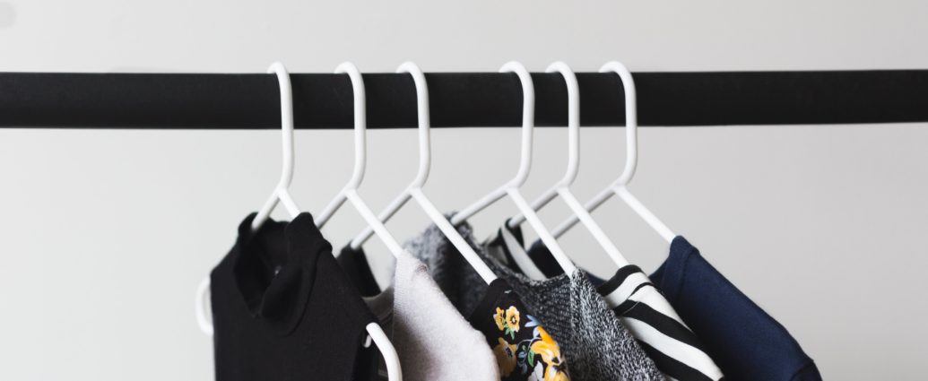 Black and white clothing on rack