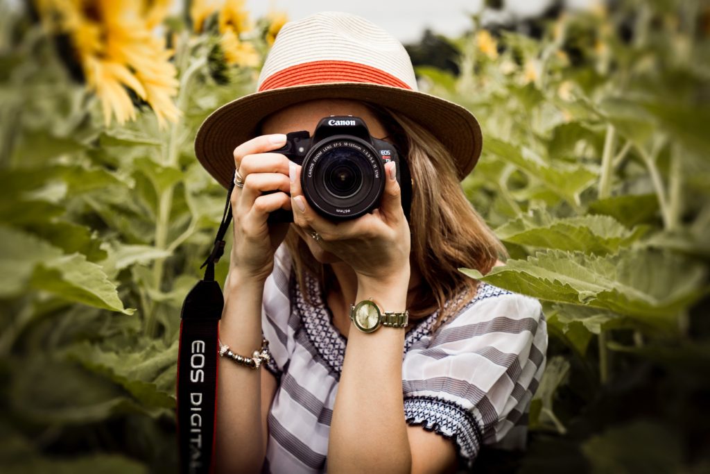 photographer holding camera